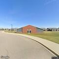 Person falls and possibly breaks arm at school playground