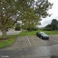 Man in wheelchair knocking on doors at hotel
