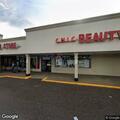 Officer detains man outside dollar store