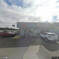 Police with highly intoxicated man at donut shop