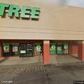 Intoxicated man stumbling in shopping plaza lot