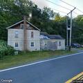 Report of gas issue at house on River Road