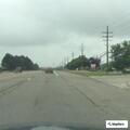 Person slumped over in vehicle on I-96 near Wixom