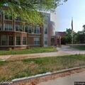 Officer contacts person outside Hall Street address