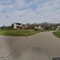 Person experiencing breathing problem at home