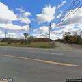 Person having a seizure in vehicle at Wixom Rd
