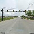 Silver SUV driving without headlights and ran red light