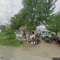 People reportedly trying to take trailer from property