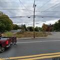 Person transported from police department to hospital
