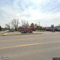 Traffic stop involving blue Buick at gas station