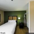 Man with heart palpitations and memory issues in hotel lobby