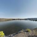 Three females stranded on rocks at Black Beach lake