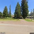 Person experiencing abdominal pain near Butte Falls