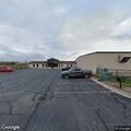 Brush fire between airport hangars in Troy