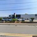 Person possibly having a heart attack behind restaurant