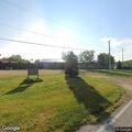 Officer checks open storage unit for intruders