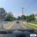 Man slumps out of vehicle at library parking lot