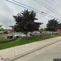 Crew checks burning odor at strip mall creamery
