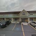 Elderly person with dementia and breathing issues at clinic