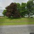 Vehicle reported off roadway on Assyria Road