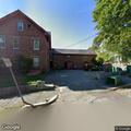 Person reports abdominal pain near Fitchburg