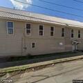Man vomiting in apartment on Main Street