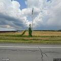 Driver took photos in driveway, then left toward Castile