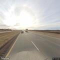 Slow-moving vehicle with hazards on I-29