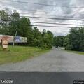 Tree and utility pole on fire on Troy Road