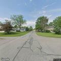 Tree blocking road with power line involved