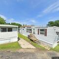 Woman threatens to beat resident at mobile home park