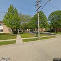 Person suffering abdominal pain at Drum Court apartment