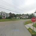 Man knocking on apartment door in Castile