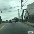 Car parked wrong way causing traffic hazard