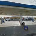 Two vehicles crash at gas station on 21 Mile Road
