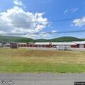 Driver with flat tire on State Route 7