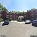 Caller reports men running in her apartment