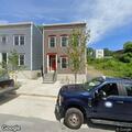 Suspicious male at front door on Orange Street