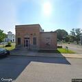 Caller reports suspicious items behind bank building