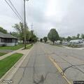 Tree branch blocking road at Detroit and Grand River