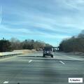 Disabled vehicle on highway with help on the way