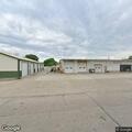 Burglary alarm with open door at construction shop