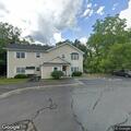 Person vomiting with severe facial redness at group home