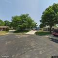 Caller reports unknown person at front door