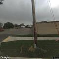 Traffic stop involving silver BMW in back lot