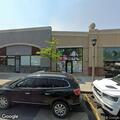 Elderly woman falls with possible hip injury in parking lot