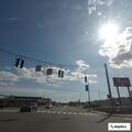 Leaning light pole reported near KFC on Broadway