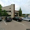 Dog locked in vehicle in office parking lot