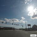 Vehicle crash on Broadway damages property