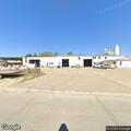 Person injured by overhead door at industrial site
